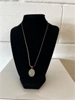 Gold tone and opal like necklace