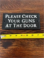 Heavy wall sign cast iron? Please check your guns