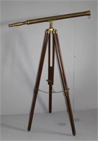 unique brass telescope on wood tripod stand