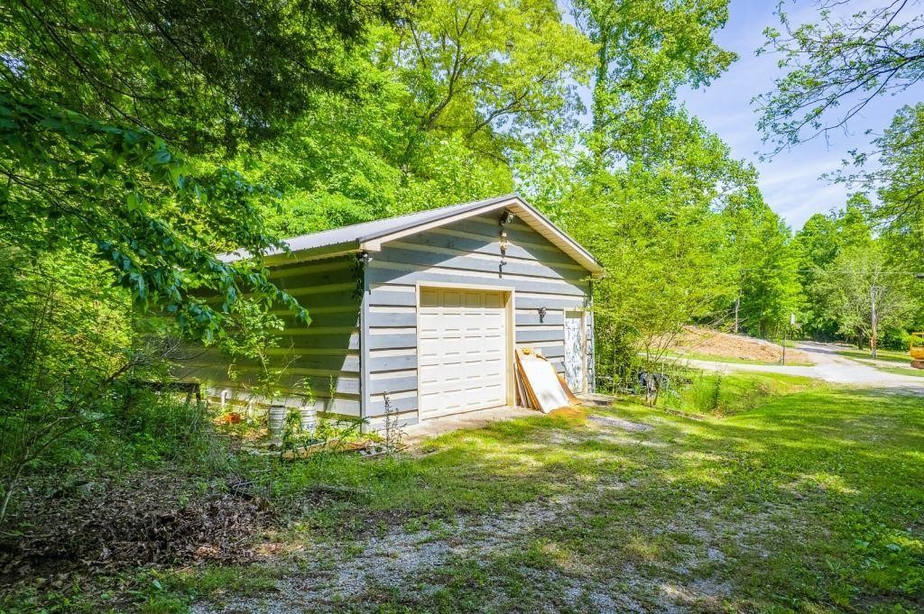 Custom Cabin & 2.5+- Acres • Dock • 2 Tracts • River Access