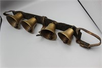 4 Antique Bells on Leather Strap!