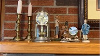 Brass candlesticks, brass clock, figures