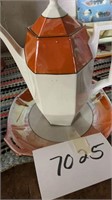 Orange tea set 
Woth pitcher creamer