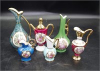 Collection six Limoges painted Ewers