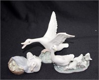 Three various Lladro duck figurines