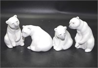 Four Lladro white polar bear figurines
