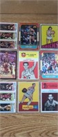 9 assorted basketball cards in plastic binder