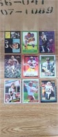 9 assorted football cards in plastic binder
