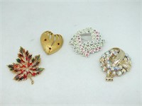 FOUR BROOCHES
