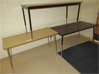 (3) Adjustable height tables.