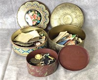 Vintage tins full of buttons and other sewing