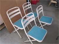 four folding chairs