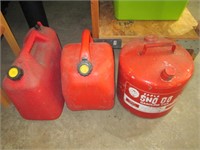 three gas cans