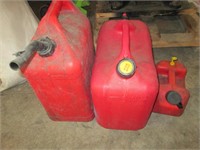two large, one small gas cans