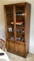 Lighted 79" cabinet with contents