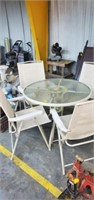 ROUND GLASS TOP PATIO TABLE AND CHAIRS