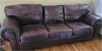 Leather sofa. No brand name found. 92ins.