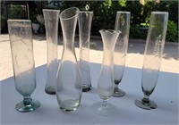Assorted bud vases. One is chipped