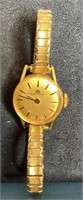 Ladies Bucherer watch with 18k gold case