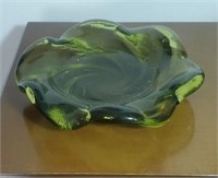 Round heavy green glass dish