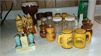 Lot of Salt & Pepper Shakers and brown vase/cup