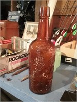 Vintage amber colored wine bottle