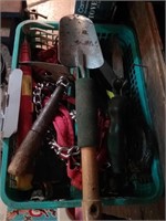 Green tray of garden tools and other