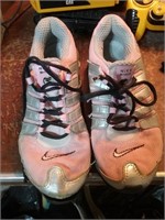Nike worn size six and a half pink and silver