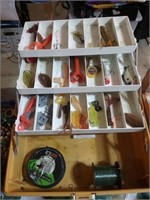 Tackle box with fishing lures and bait