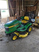 John Deere X320 mower with cab and blower