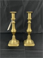 Pair of Early American Brass Push Up Candlesticks