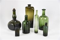 7 Early Green Glass Bottles