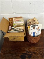 2 containers full of vintage sewing patterns