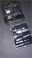 Pair of Small Travel Manicure Sets 
In Cases.