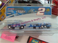 12 various die cast racecar models --