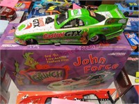 3 diecast 1:24 stock cars Looney Tunes & Grinch
