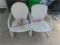 2 White metal patio chairs
