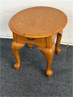 Oval end table w pull out drawer
