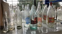 LARGE QTY OF SOFT DRINK AND CORDIAL BOTTLES