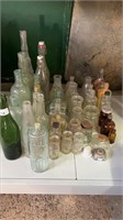 LARGE QTY OF ASSORTED BOTTLES INCLUDES
