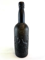 EARLY REG. BEER BOTTLE WITH REARING HORSE