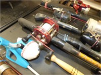 SEVERAL FISHING RODS AND REELS & TACKLE BOXES