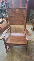 Wooden and wicker rocking chair