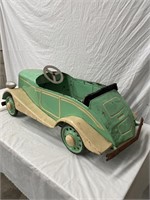 Early French metal body pedal car