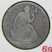 1877 Seated liberty silver half dollar.