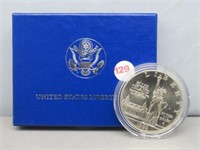 1986 US liberty UNC silver dollar with COA and