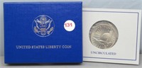 1986 US liberty clad UNC half dollar with COA and
