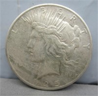 1925 Peace silver dollar.