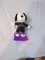 Assortment of Snoopy and Alice-N-Wonderland Dolls