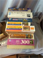 2 Boxes of Puzzles